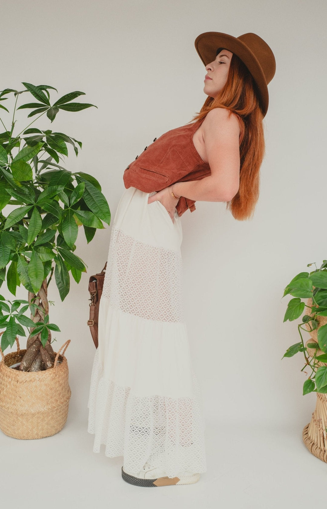 Woman wear boho style maxi skirt and Rolla's vest.