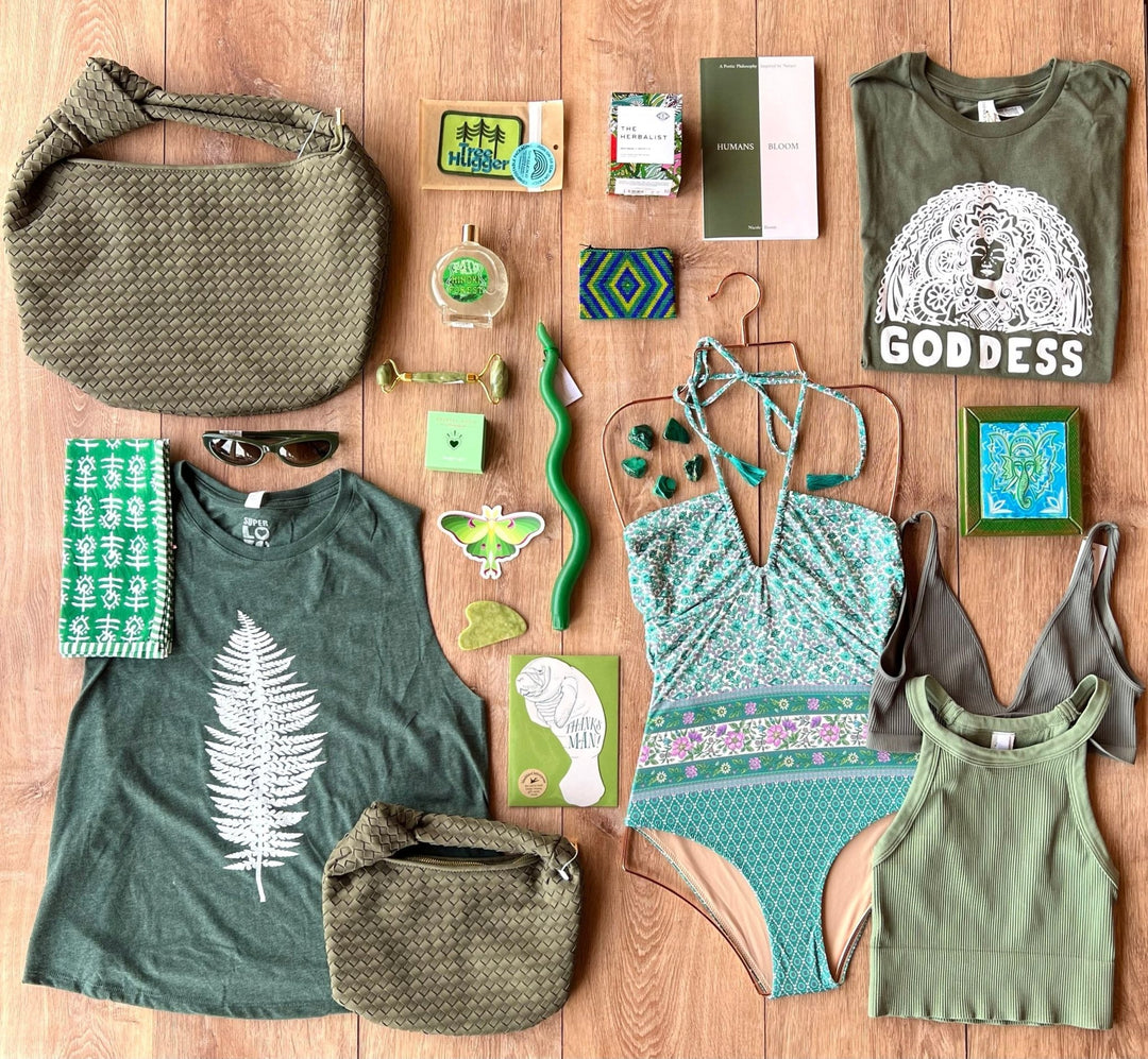Flat lay of green items from gift selection on Meadow Collective Boutique.