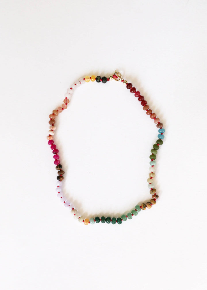 Sedona pink and green gemstone necklace laid flat