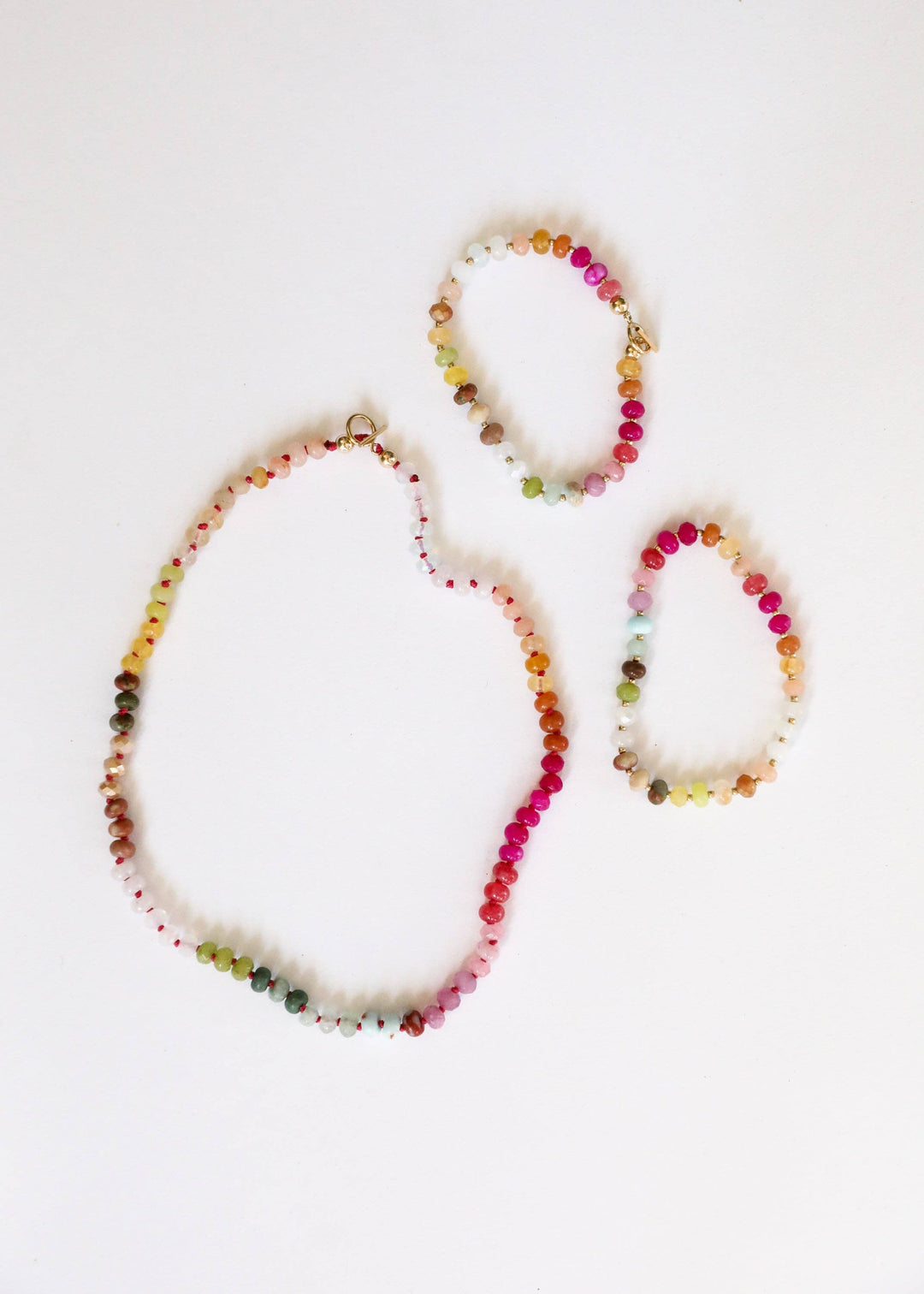 Sandbar gemstone necklace shown with matching bracelets