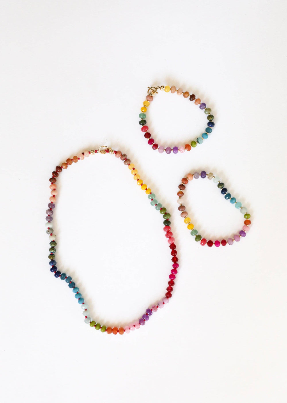 Gold Rush gemstone necklace shown with matching bracelets