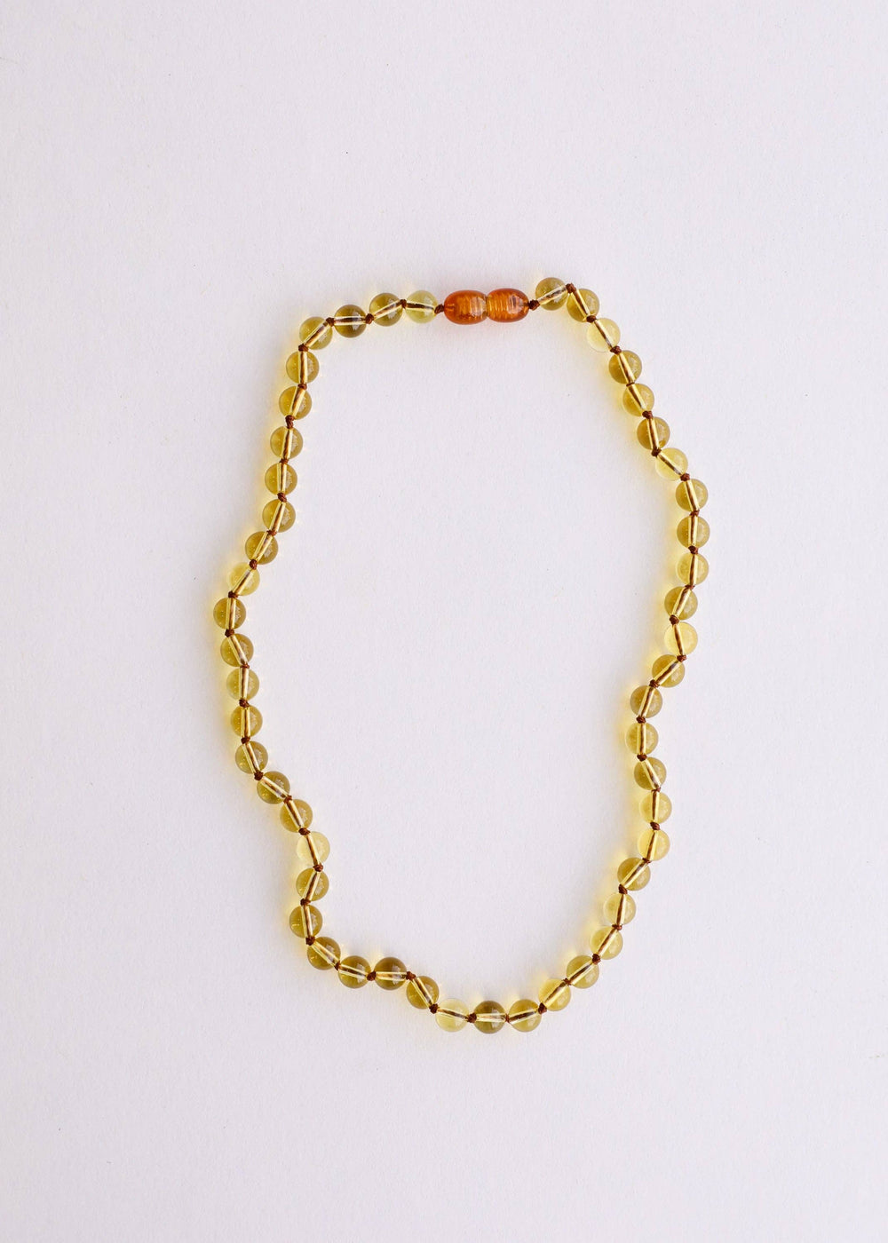 Pure citrine gemstone necklace laid flat