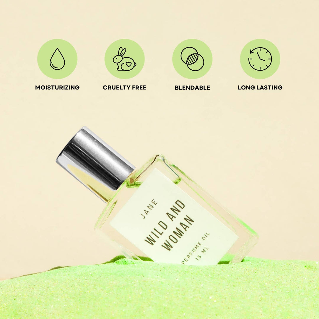 Jane perfume oil on green moss with icons for moisturizing, cruelty free, blendable and long lasting