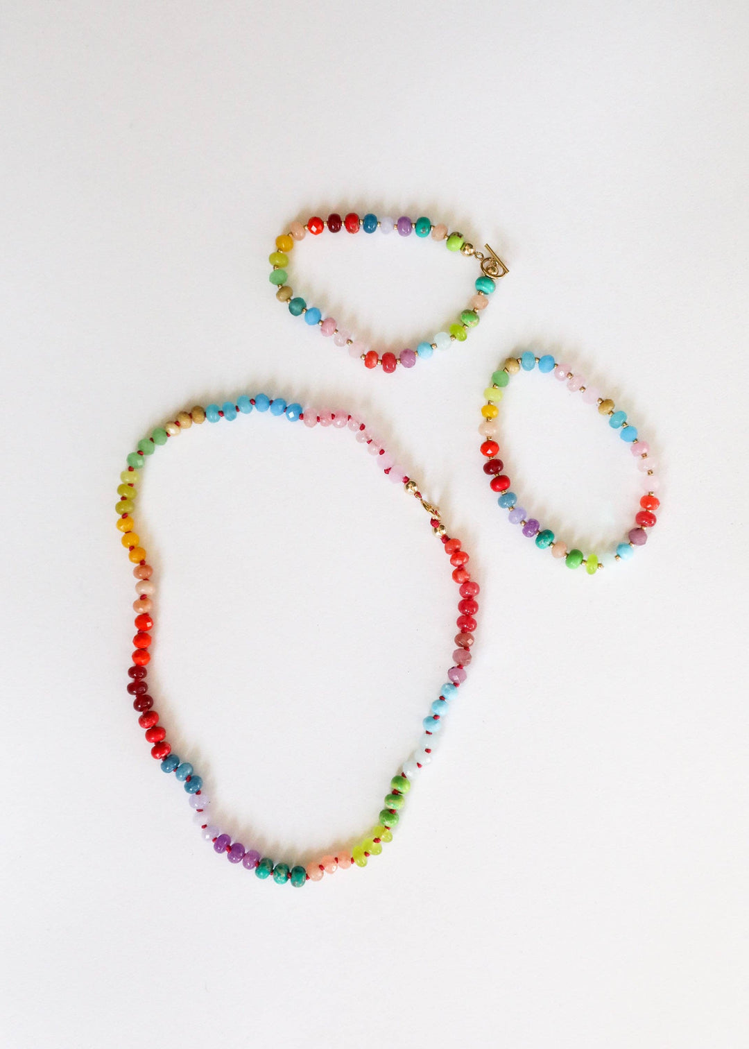 Skyline gemstone necklace shown with matching bracelets