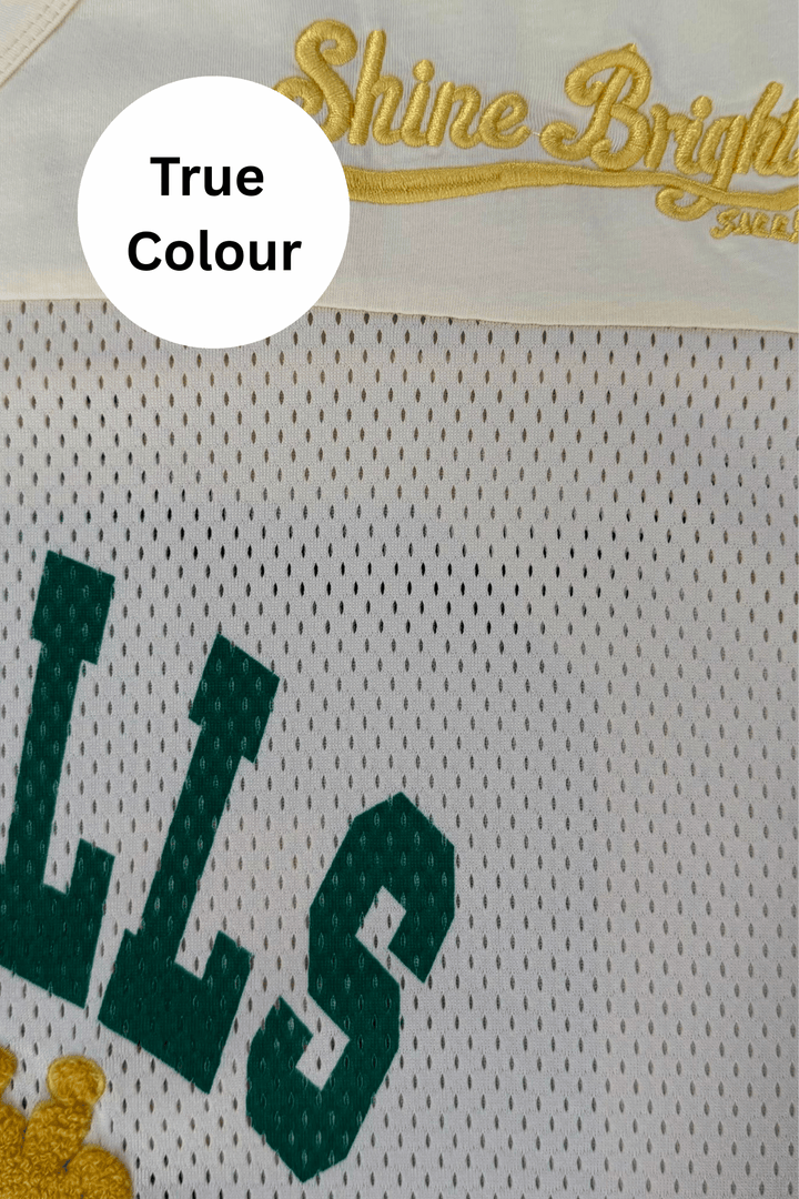 Cream Sabbi Court Side mesh tee shown true to size on a model