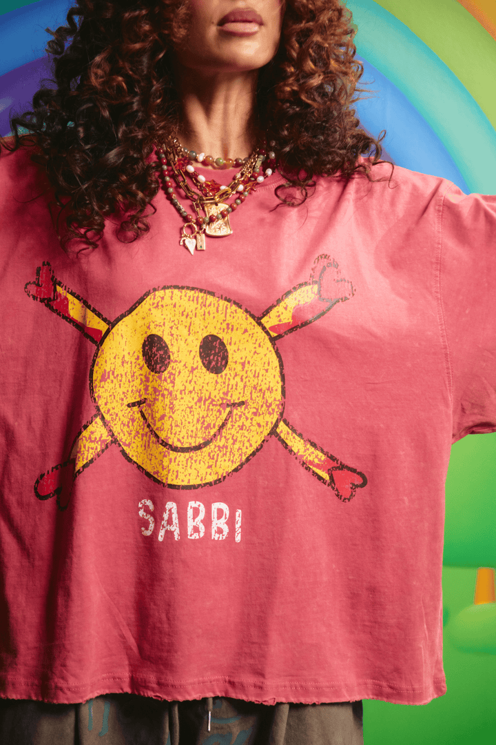 Close-up detail of the back message on the Guy Smiley tee