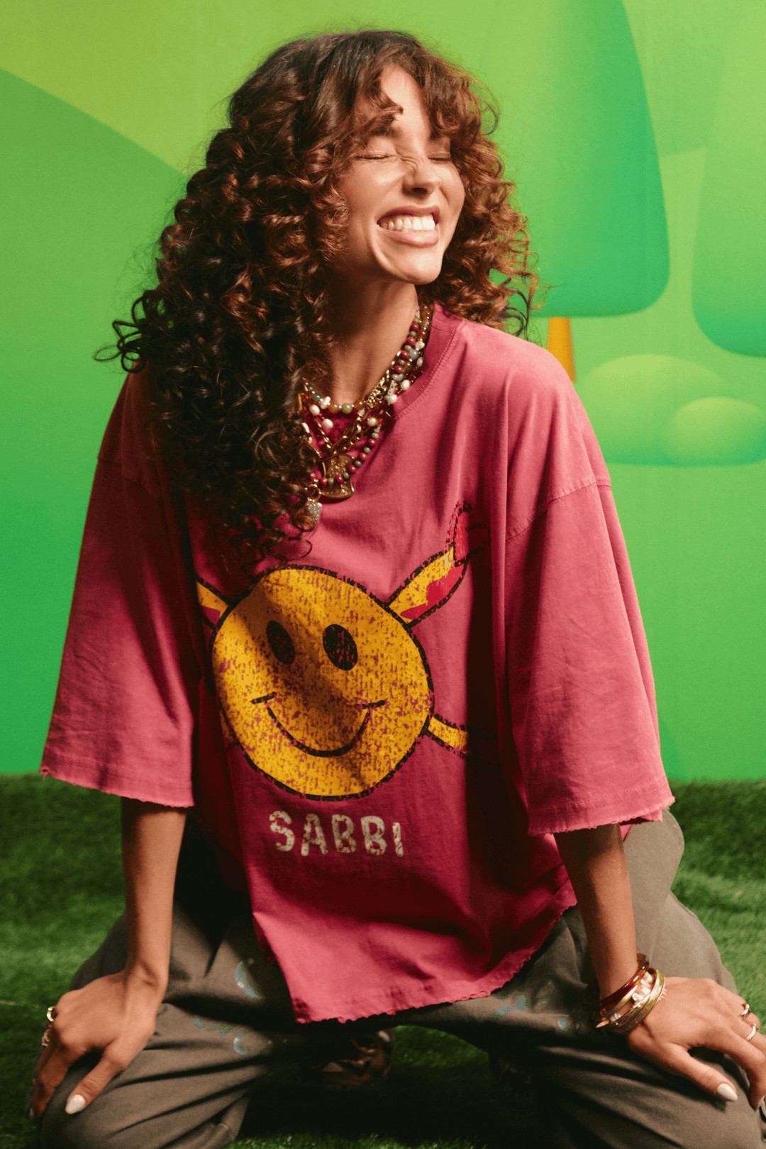 Model wearing the Sabbi Guy Smiley tee, front view