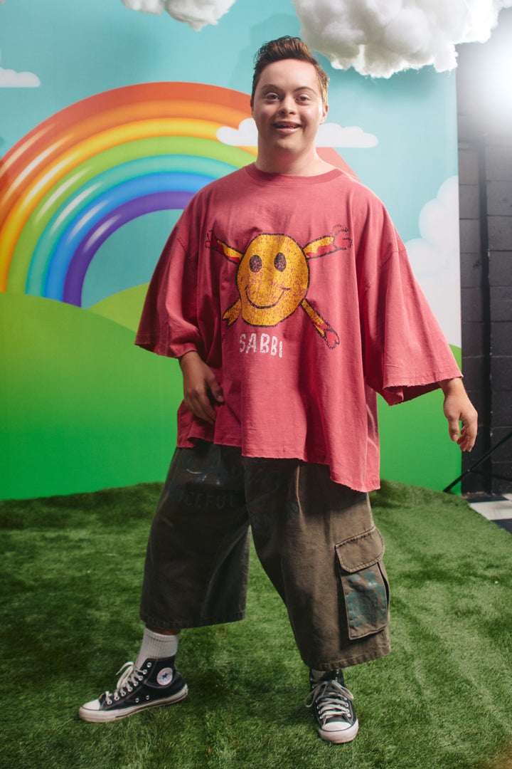 Model wearing the Sabbi Guy Smiley tee, alternate view
