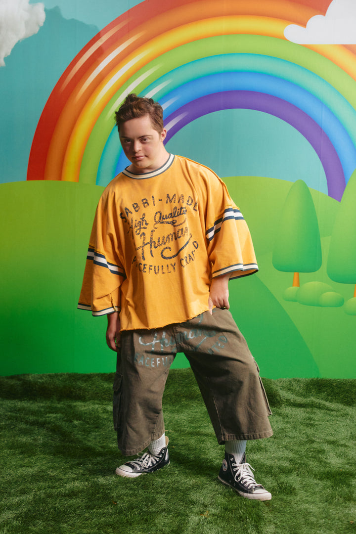 Model wearing the Sabbi Happy Hour tee, alternate view
