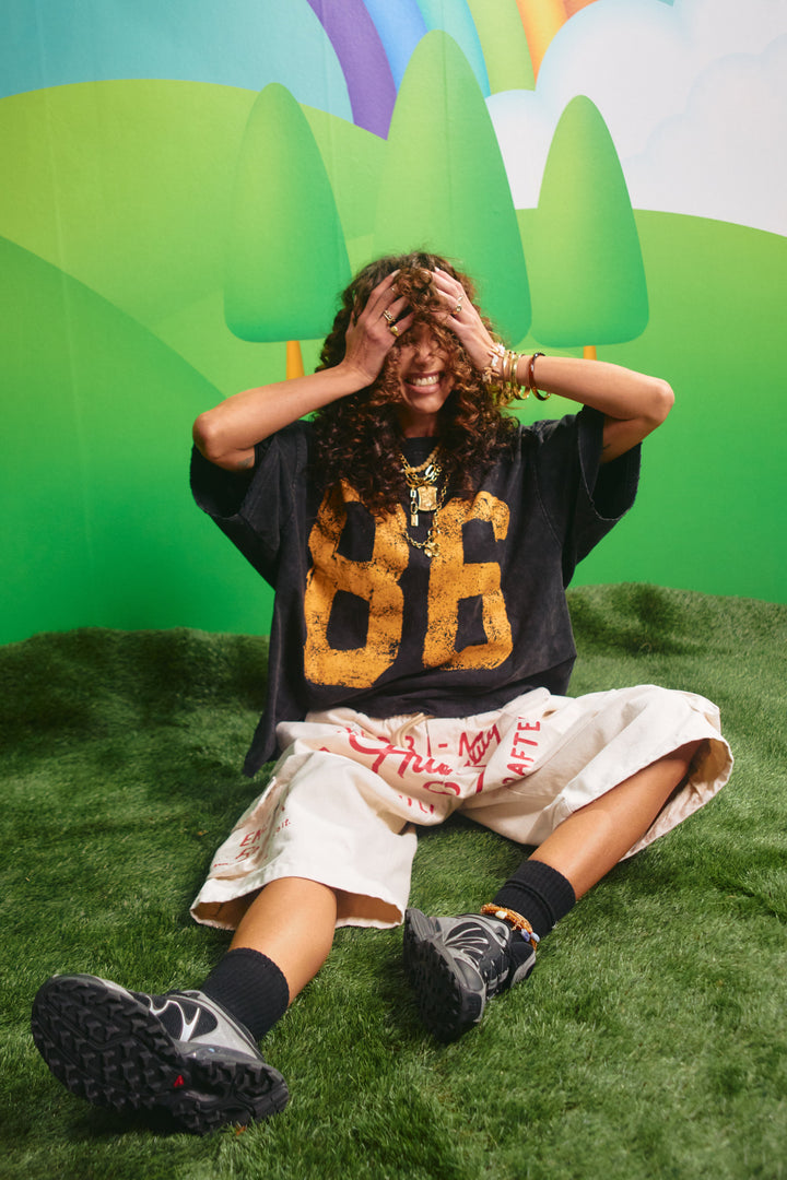 Model wearing the Sabbi High Quality Human Jorts in cream, alternate view