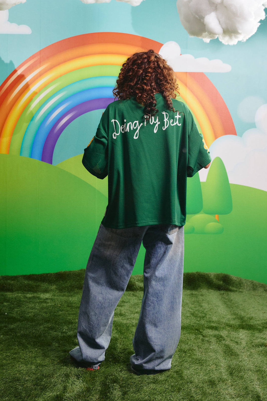 Back view of the green mesh tee showing the Doing My Best graphic