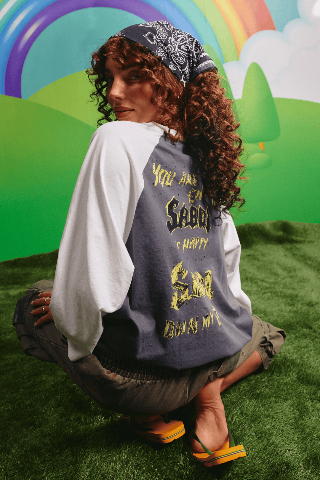 Back view of the Raglan Kindness Is King tee showing the back graphic