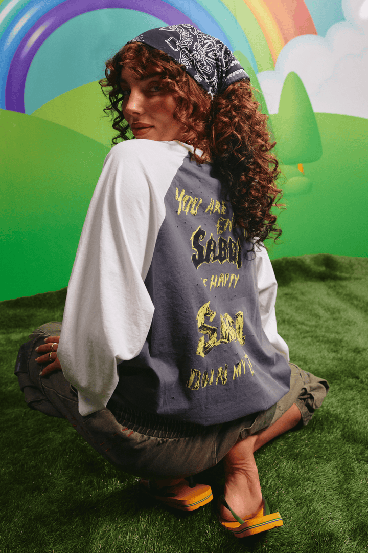 Back view of the Raglan Kindness Is King tee showing the back graphic