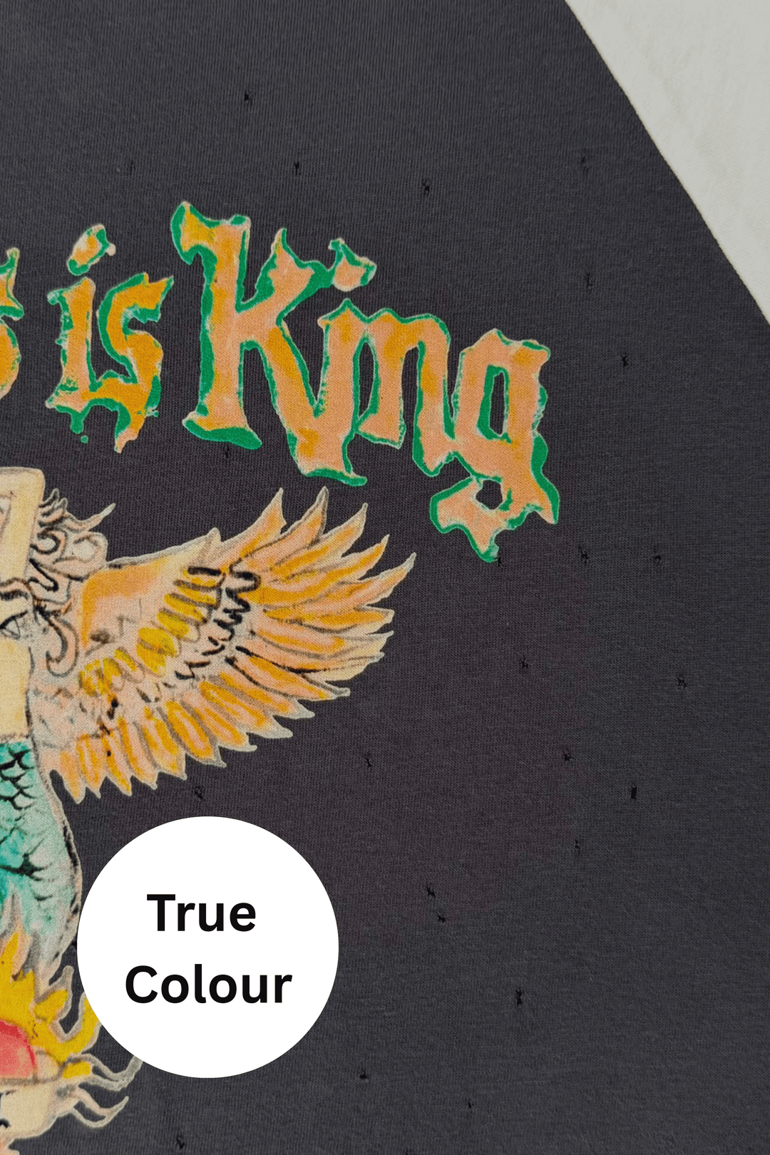 Charcoal Raglan Kindness Is King tee shown true to size on a model