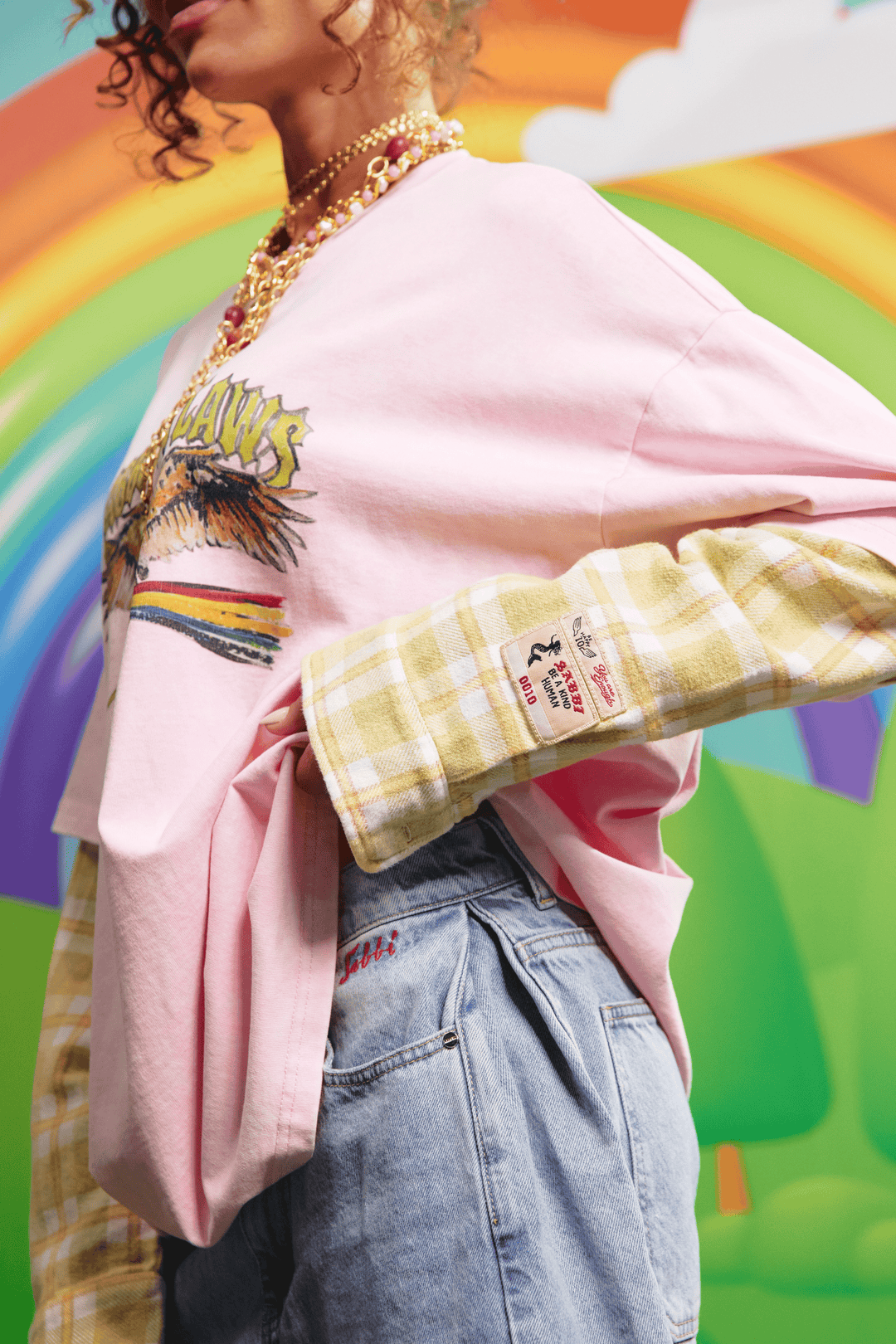 Close-up detail of the green check sleeve fabric