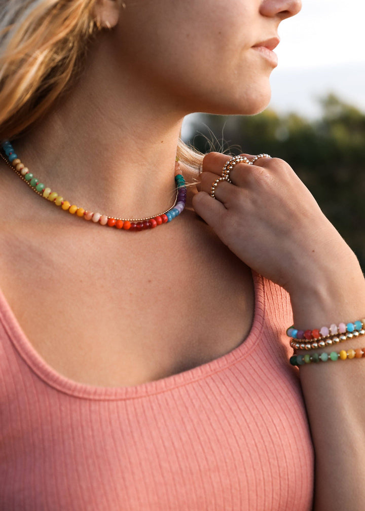 Side view of the Skyline rainbow gemstone necklace