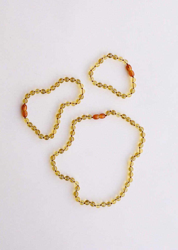 Citrine gemstone necklace shown with matching bracelets