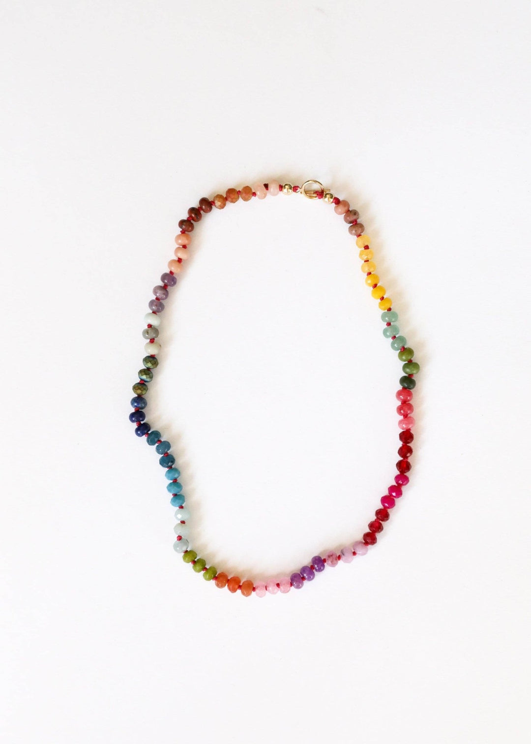 Gold Rush multicolor gemstone necklace laid flat