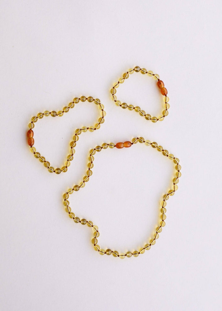 Citrine gemstone necklace shown with matching bracelets