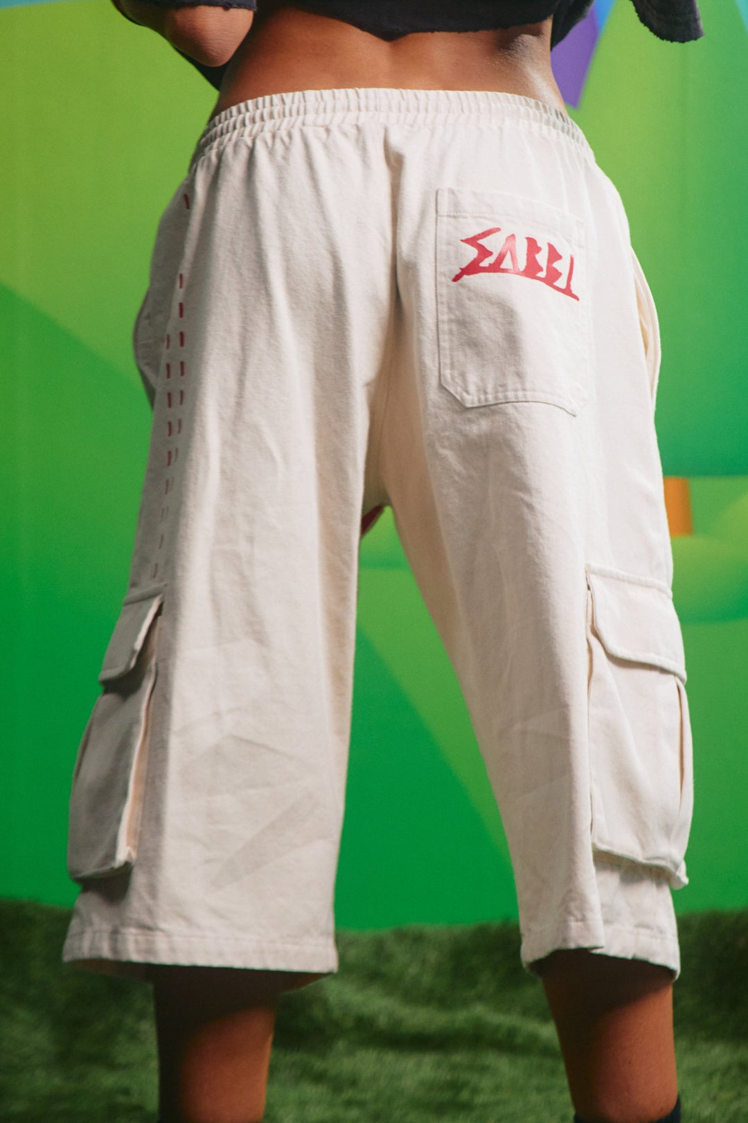 Back view of the cream High Quality Human Jorts showing the back patch pocket