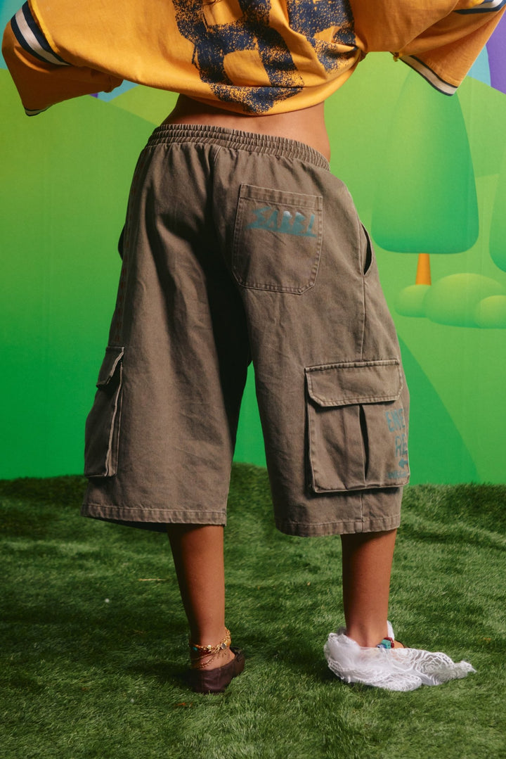 Back view of the khaki High Quality Human Jorts showing the back patch pocket