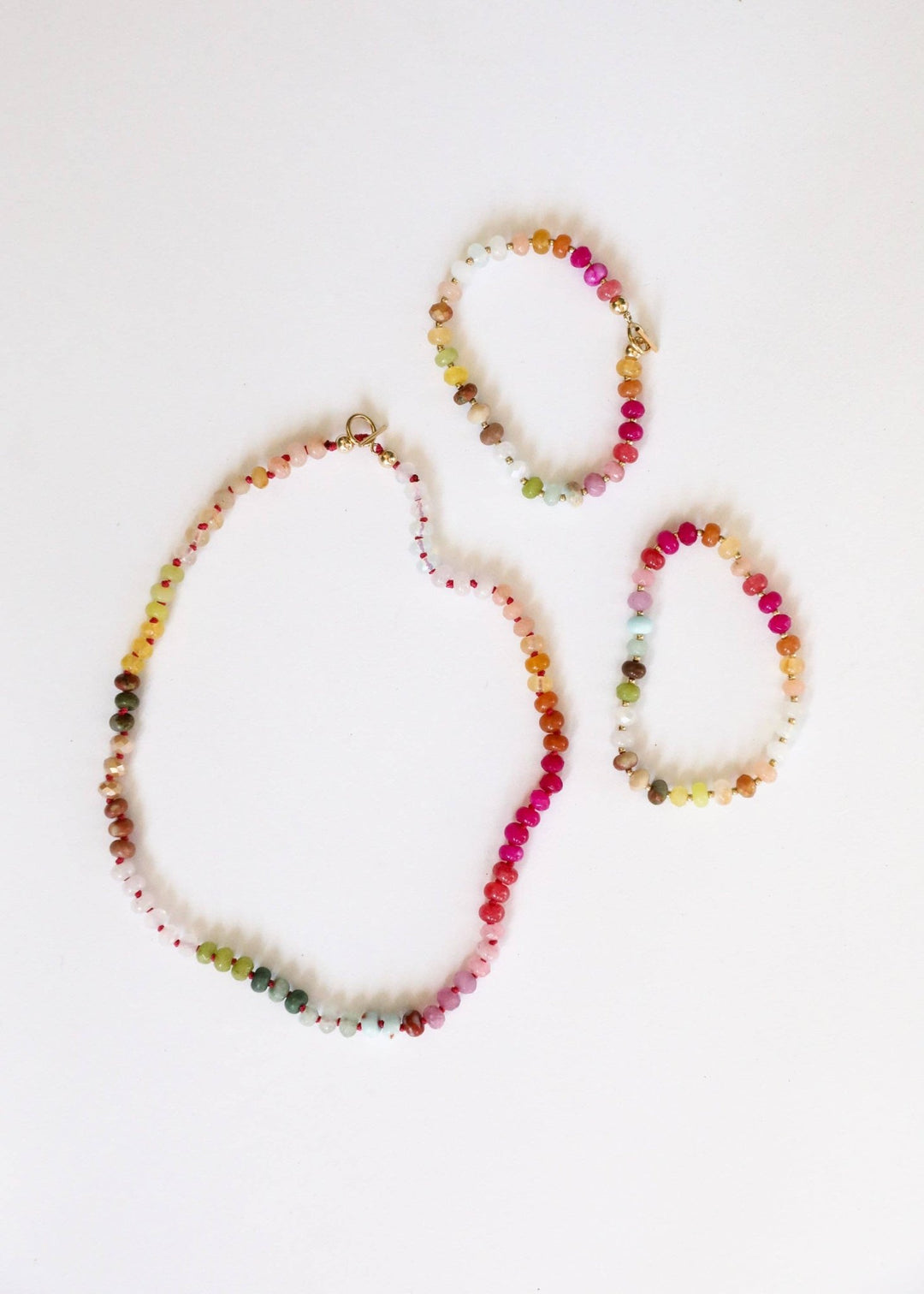 Sandbar gemstone necklace shown with matching bracelets