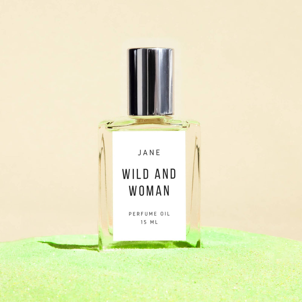 Jane perfume oil 15 ml glass rollerball on green moss