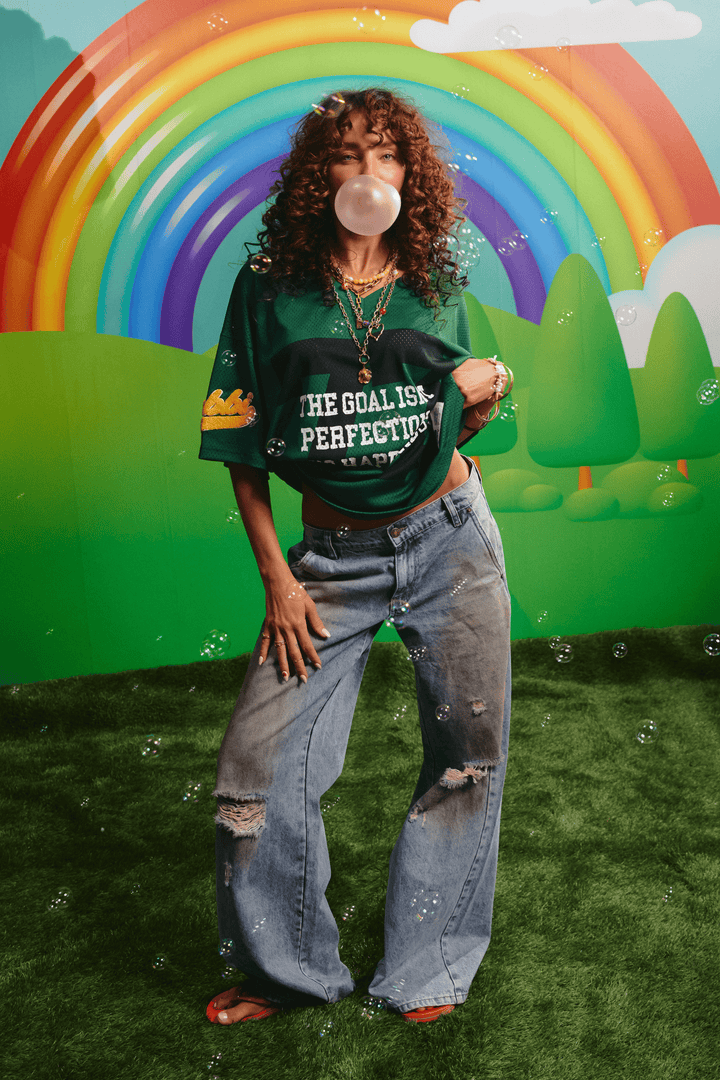 Model wearing the Sabbi Dirty Denim Jeans, mid rise