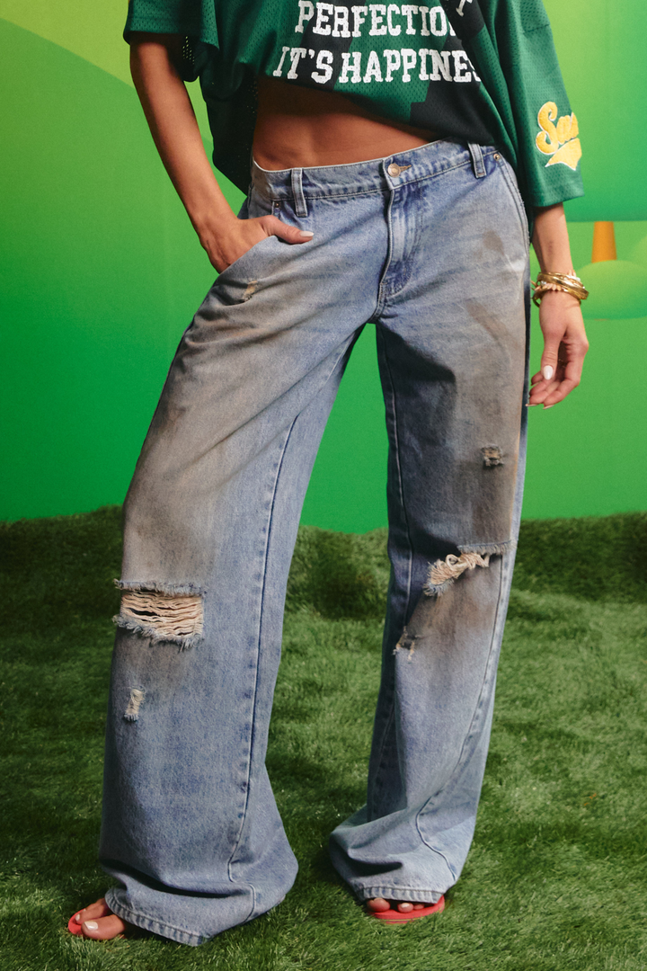 Sabbi Dirty Denim Jeans in mid rise, front view showing distressed wash