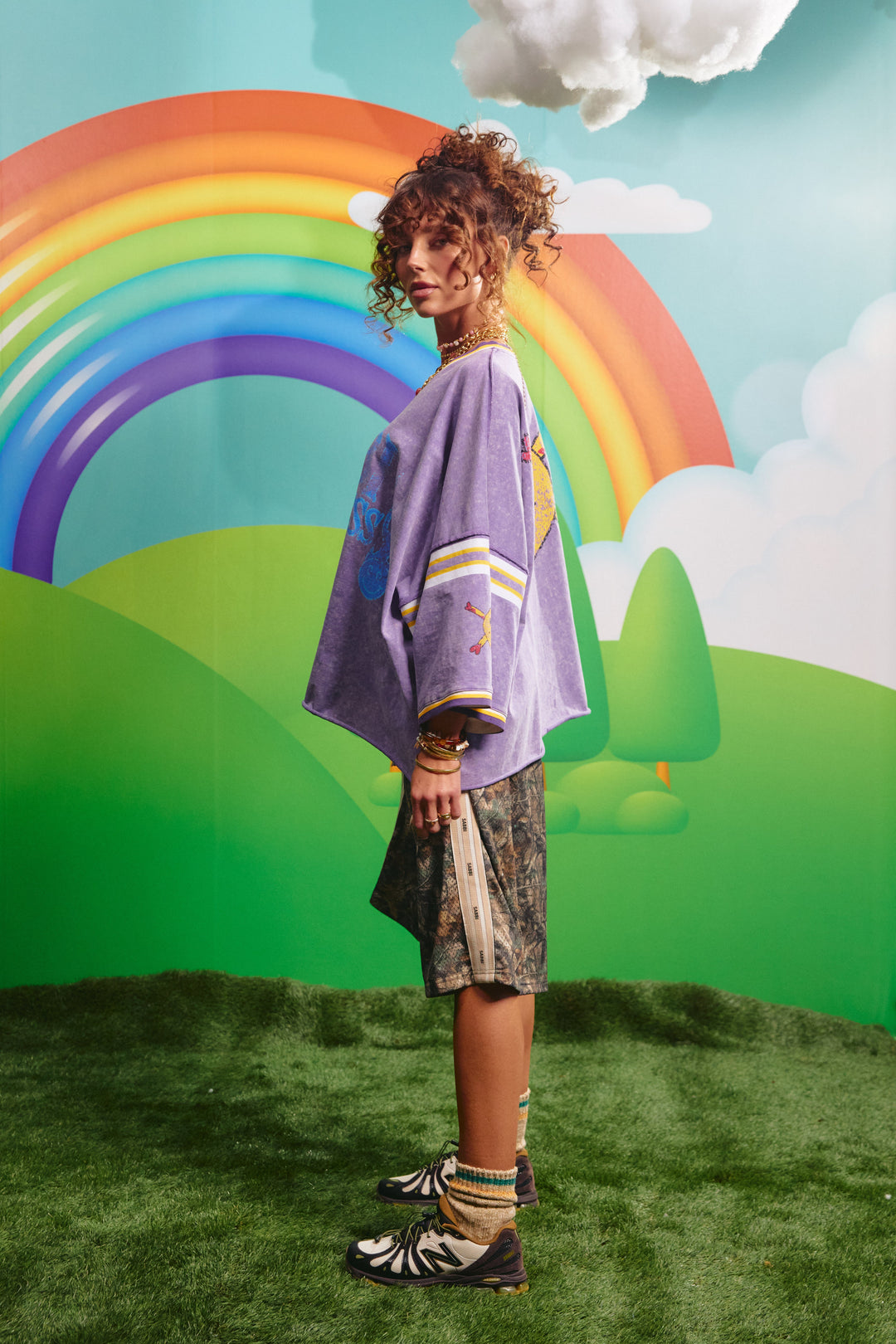 Side view of the oversized purple Glad Rag tee showing the relaxed fit