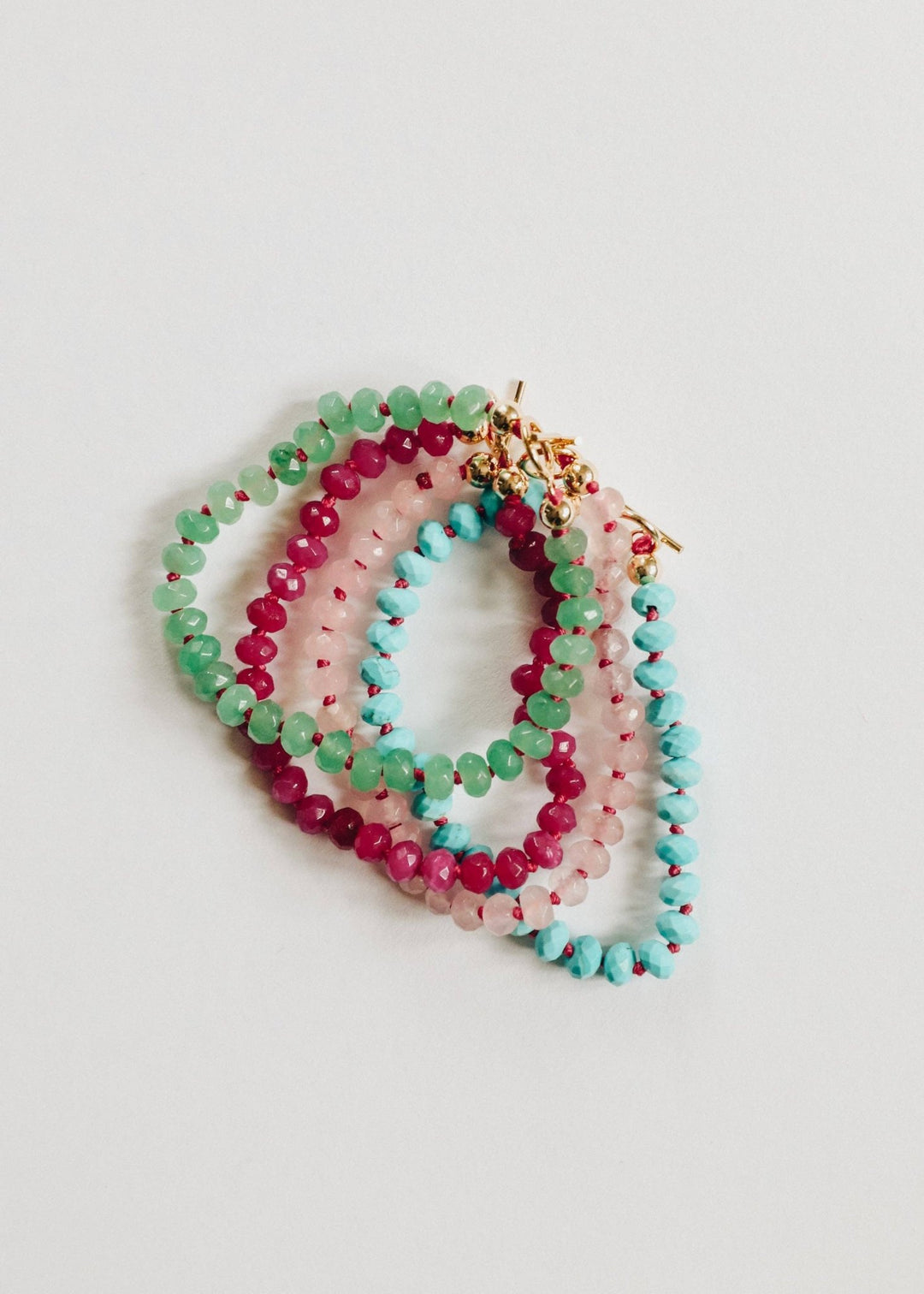 Turquoise, pink and green gemstone necklaces with gold toggle clasps